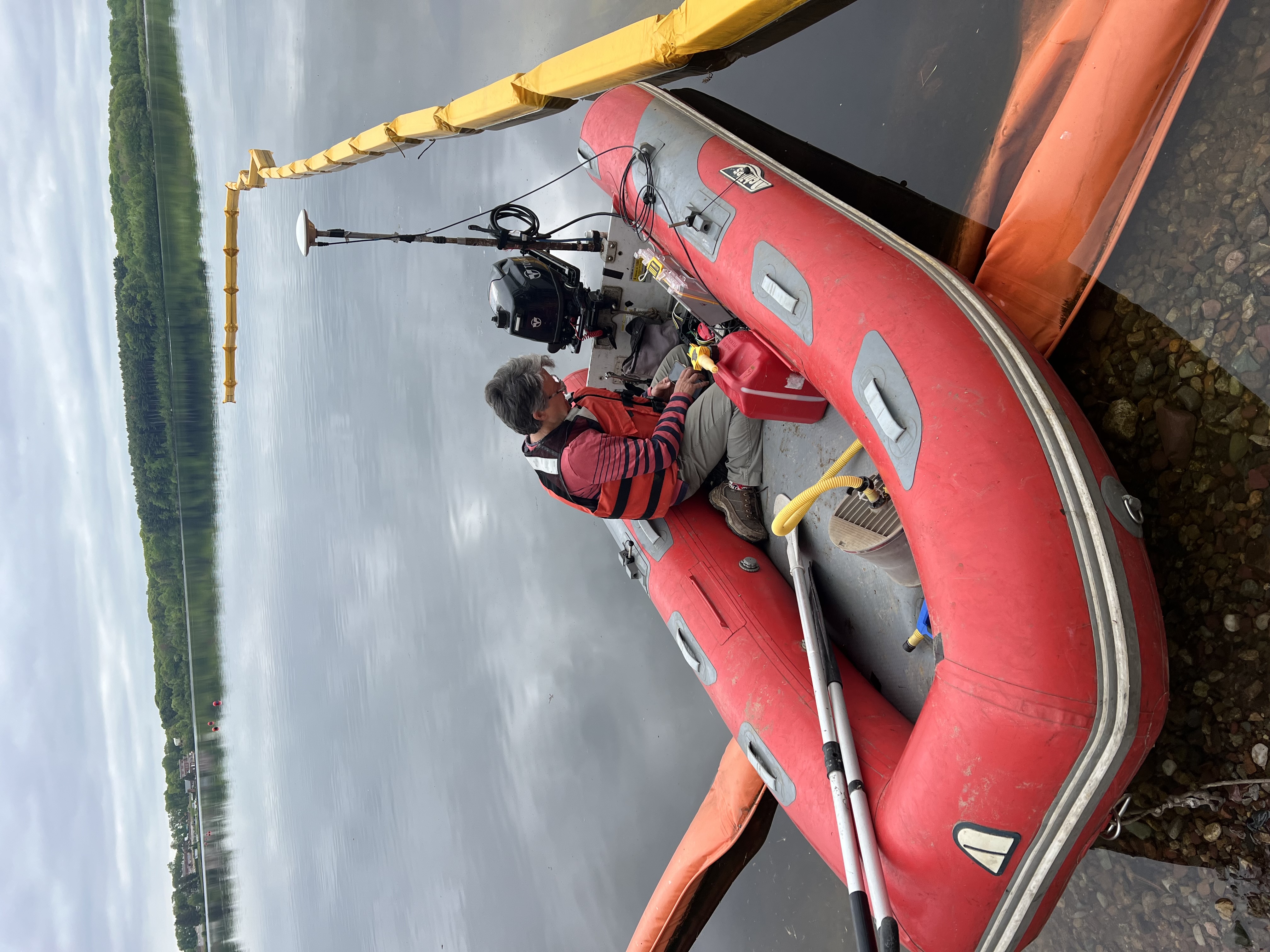 Survey vessel conducting bathymetric survey in a coastal harbor